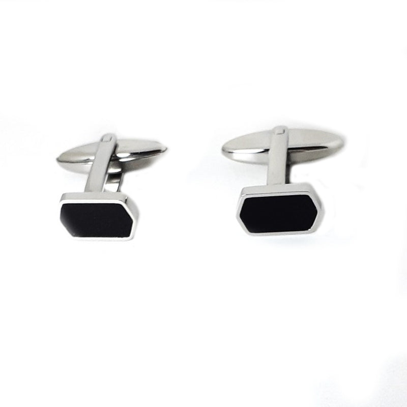 Elegant silver cufflinks with black hexagonal design, perfect for formal occasions and adding a touch of sophistication to any outfit.