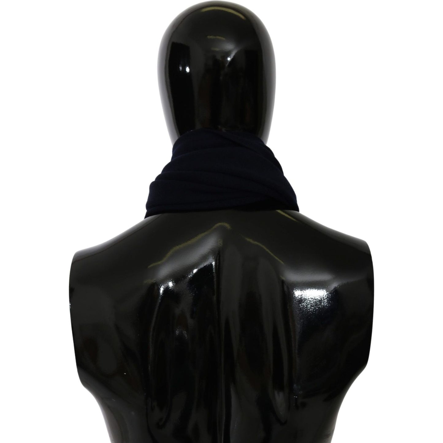 Dolce Gabbana blue wool scarf displayed on a mannequin from the back, showcasing its stylish wrap around the neck.