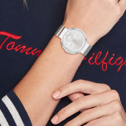 Woman's wrist wearing TOMMY HILFIGER Mod. 1782537 quartz analog watch with mineral dial and silver bracelet.
