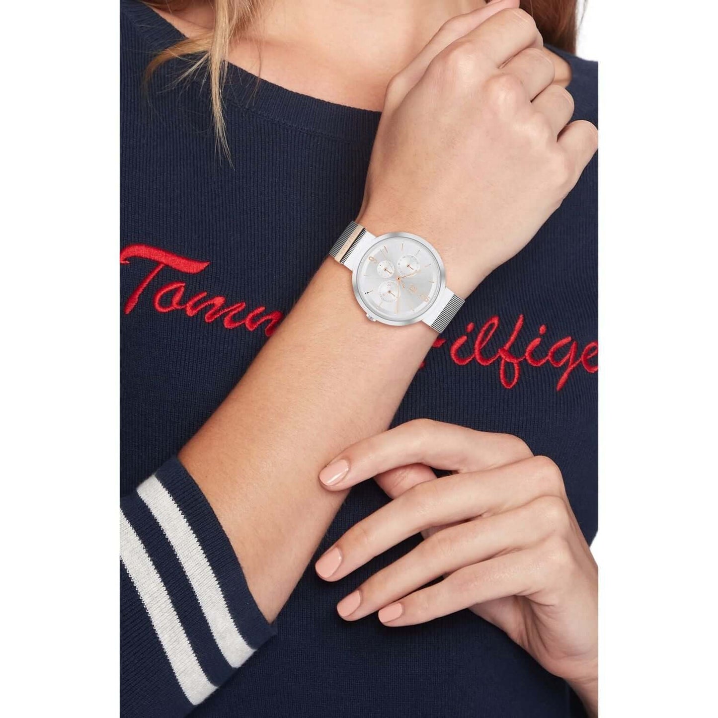 Lady wearing TOMMY HILFIGER Mod. 1782537 quartz analog watch with bracelet, 40 mm case, mineral dial, water resistant 3 ATM.
