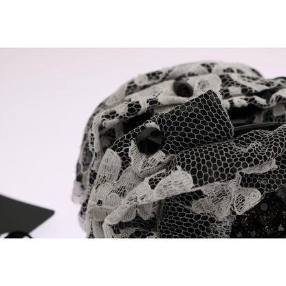 Dolce Gabbana floral lace hair claw featuring black and white lace with crystal embellishments, detail close-up.