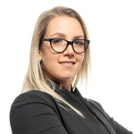 Woman wearing Emilio Pucci Black Women Glasses Frame with black full-rim style and plastic material, shown with a stylish, confident look.