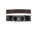 Ferragamo Reversible Belt with Gancini logo, dual-tone leather, and metal buckle, perfect accessory for versatile style.