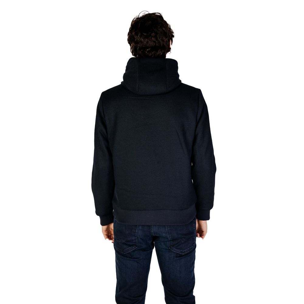 Front view with bag zipped and handles upright.