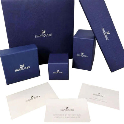 Swarovski official packaging for SWAROVSKI Mod. 5641171, featuring blue boxes and authentication certificates. Ideal gift presentation.