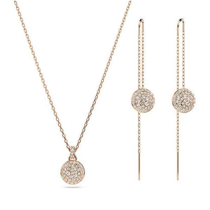 Elegant rose gold necklace and earring set with crystal embellishments.