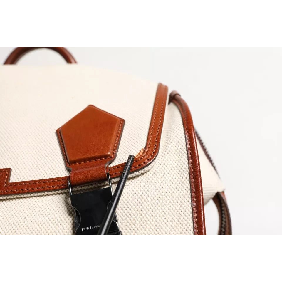 Front view with bag zipped and handles upright.