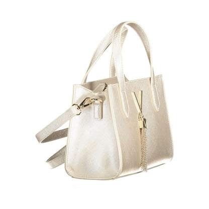 Elegant beige handbag with dual handles and a detachable shoulder strap, featuring a stylish metallic charm.