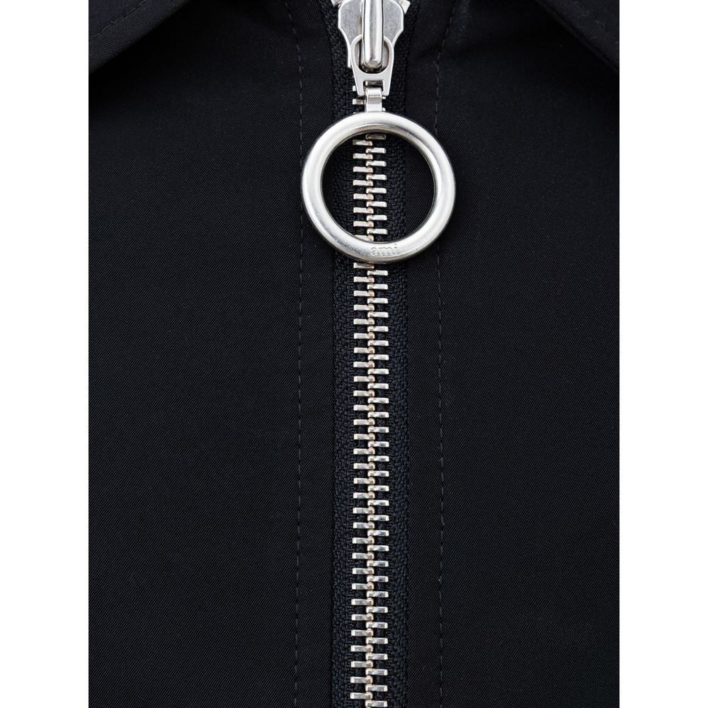 Front view with bag zipped and handles upright.