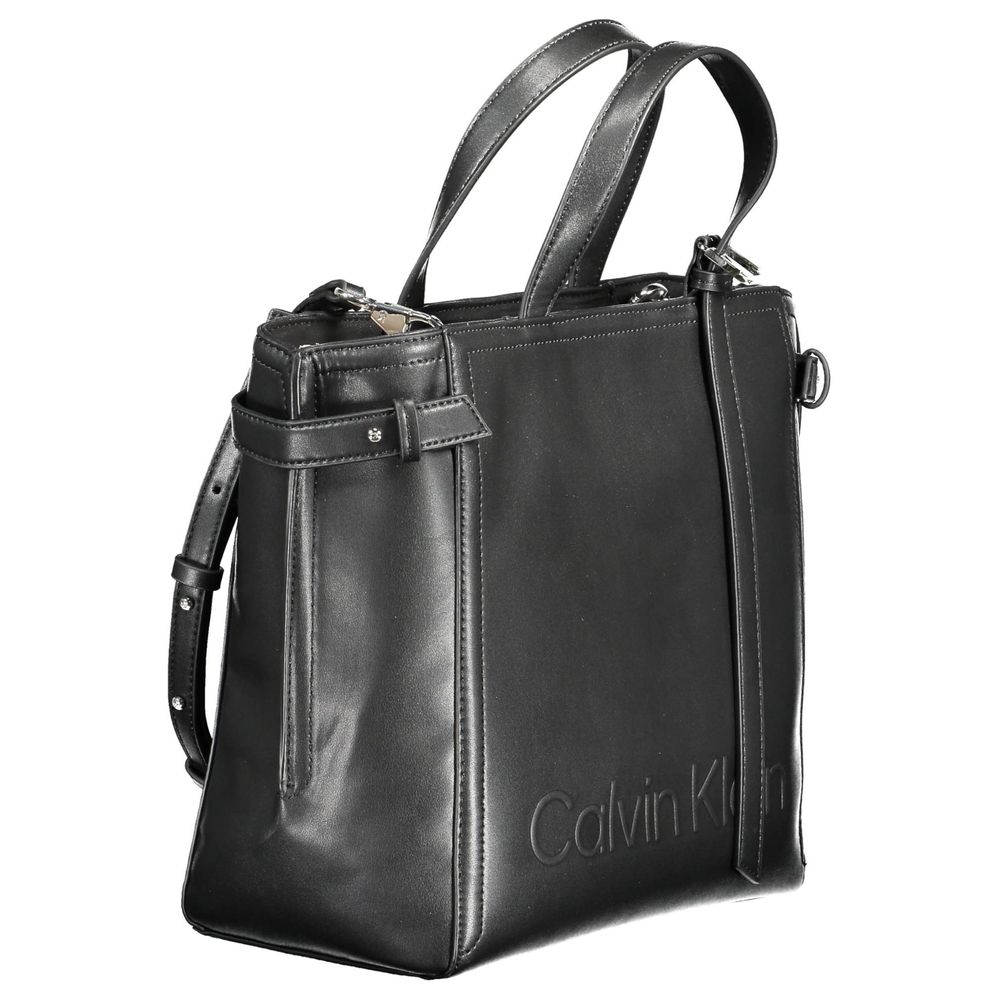 Front view with bag zipped and handles upright.