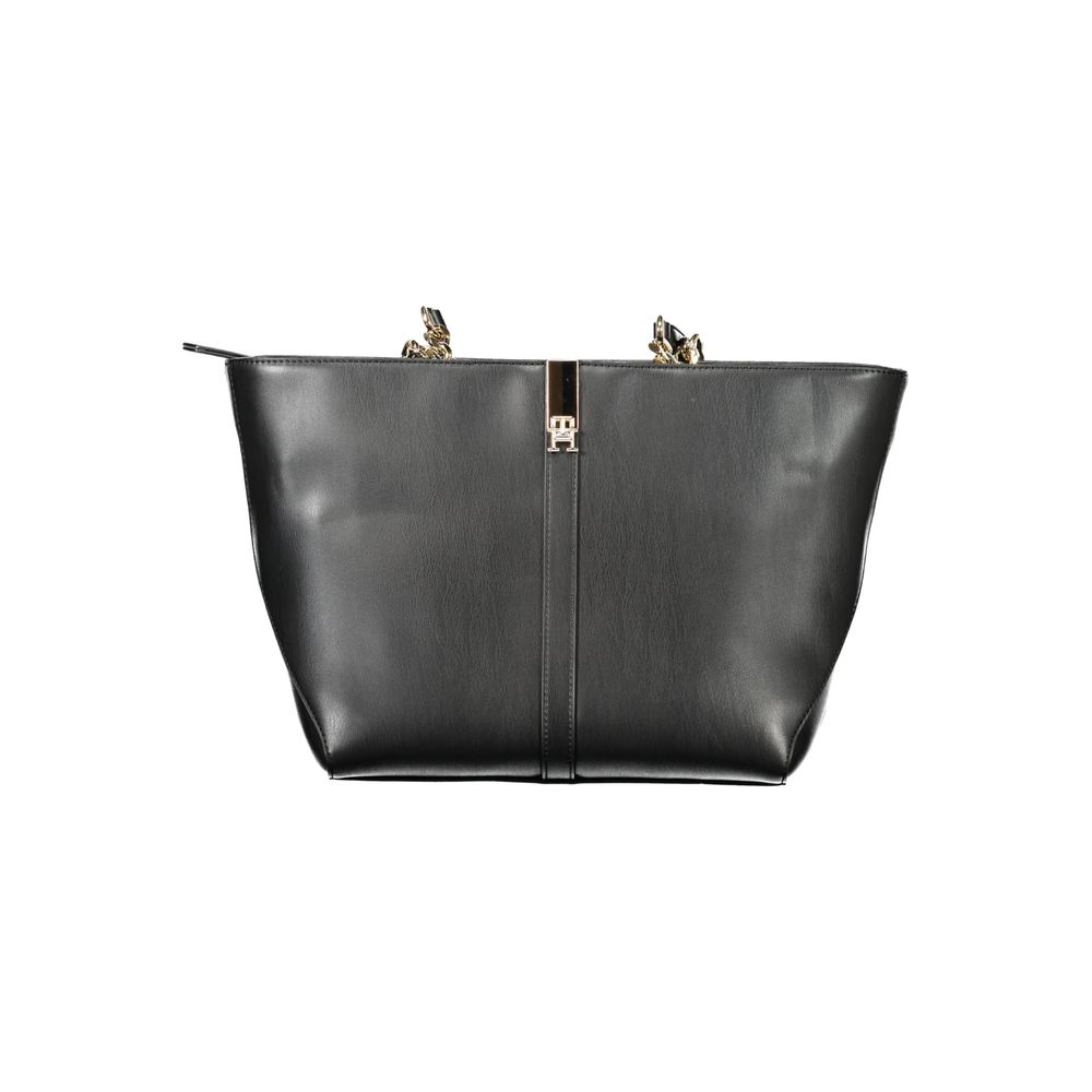 Front view with bag zipped and handles upright.