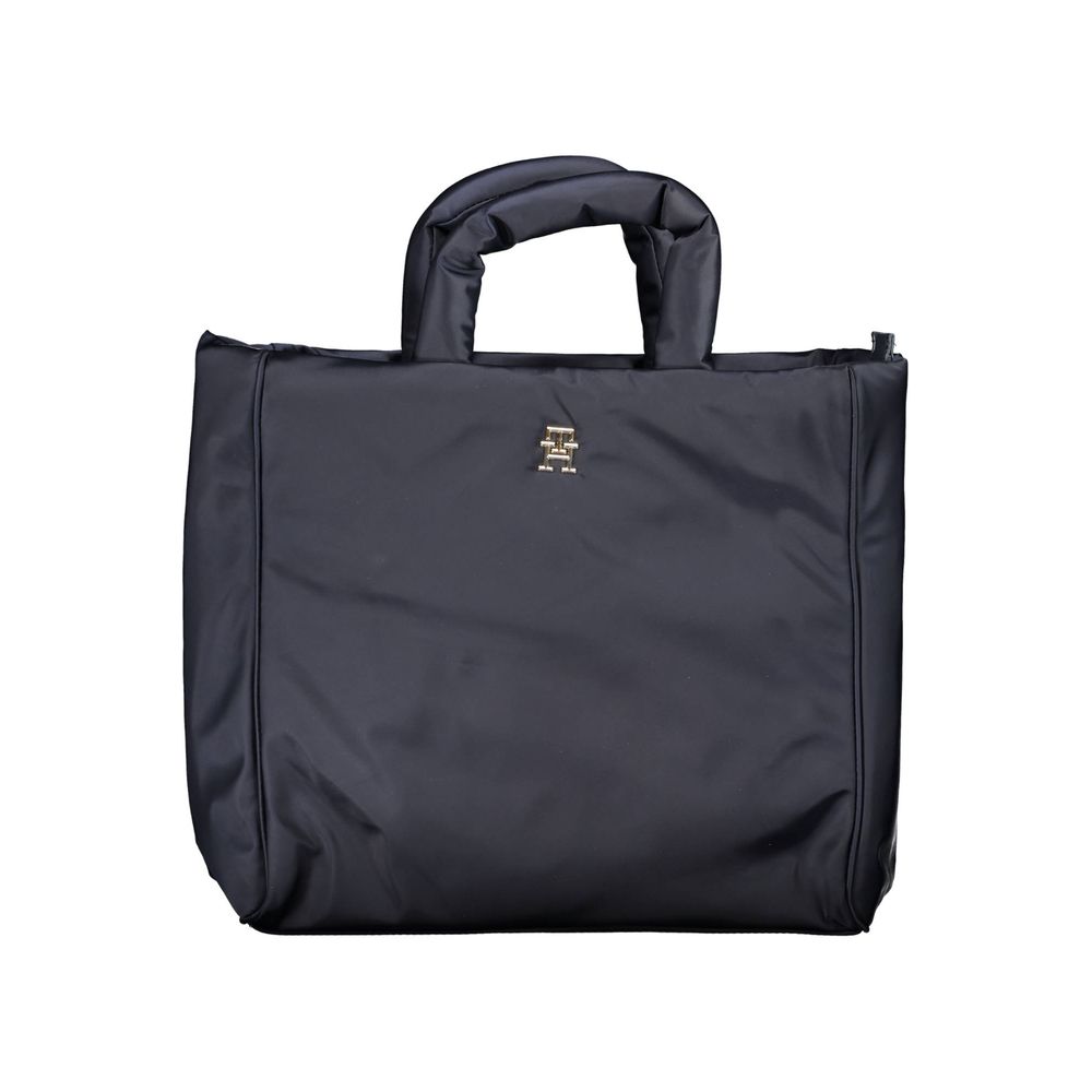Front view with bag zipped and handles upright.