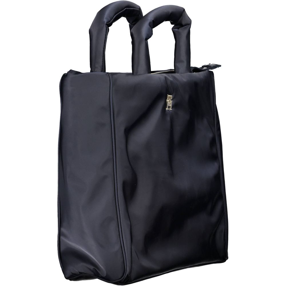 Front view with bag zipped and handles upright.