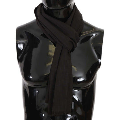 Dolce Gabbana wool striped wrap scarf displayed on a mannequin, showcasing its dark gray color and elegant design.