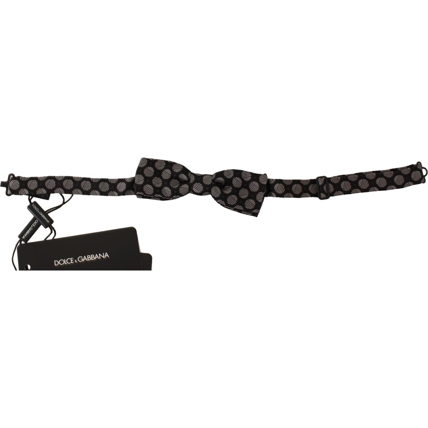 Dolce Gabbana silk polka dot bow tie in brown jacquard fabric, featuring adjustable length neck strap and brand tags.