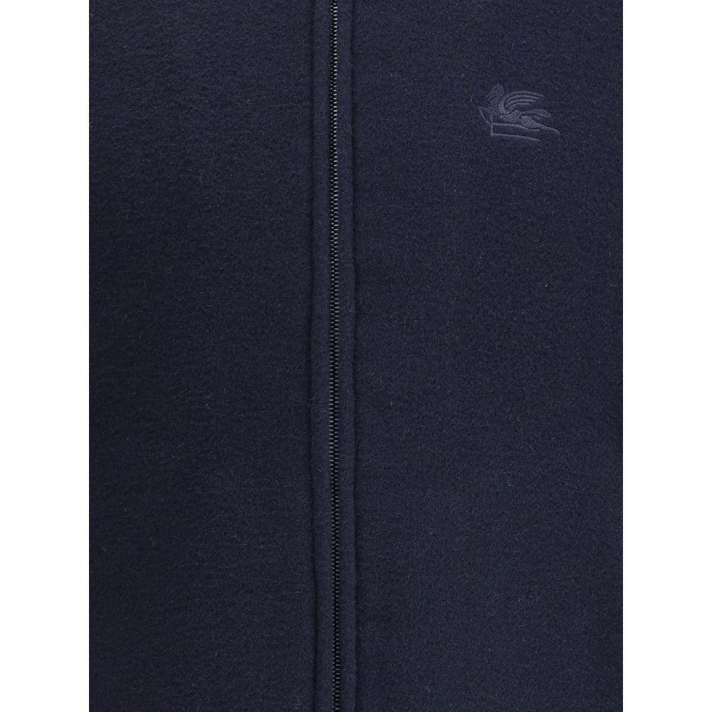 Front view with bag zipped and handles upright.