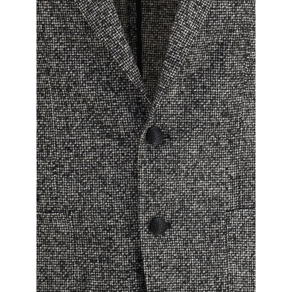 Tagliatore Gray Wool Blazer with classic lapel and front button closure, showcasing a refined textured weave. Perfect for formal occasions.