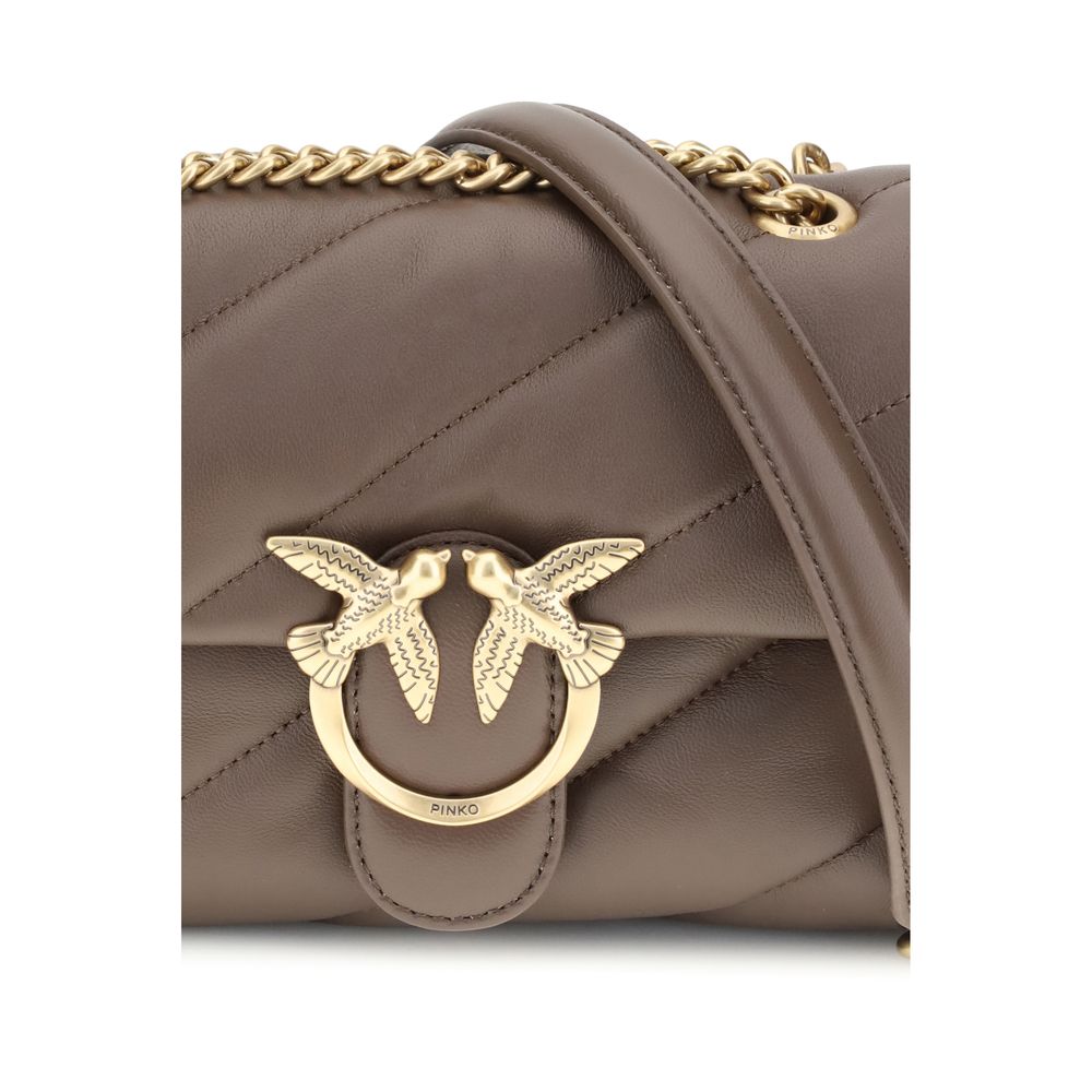 Front view with bag zipped and handles upright.