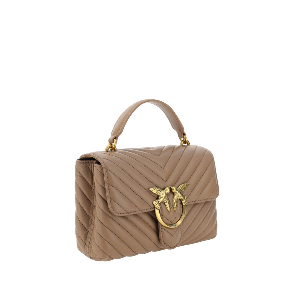Front view with bag zipped and handles upright.
