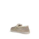 Prada Suede Loafers with fur lining and logo plaque, side view, AW25 collection, made in Italy.