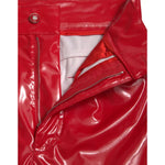 Close-up of Dolce & Gabbana Red High Waist Skinny Trouser Shiny Pants with zipper and logo details.