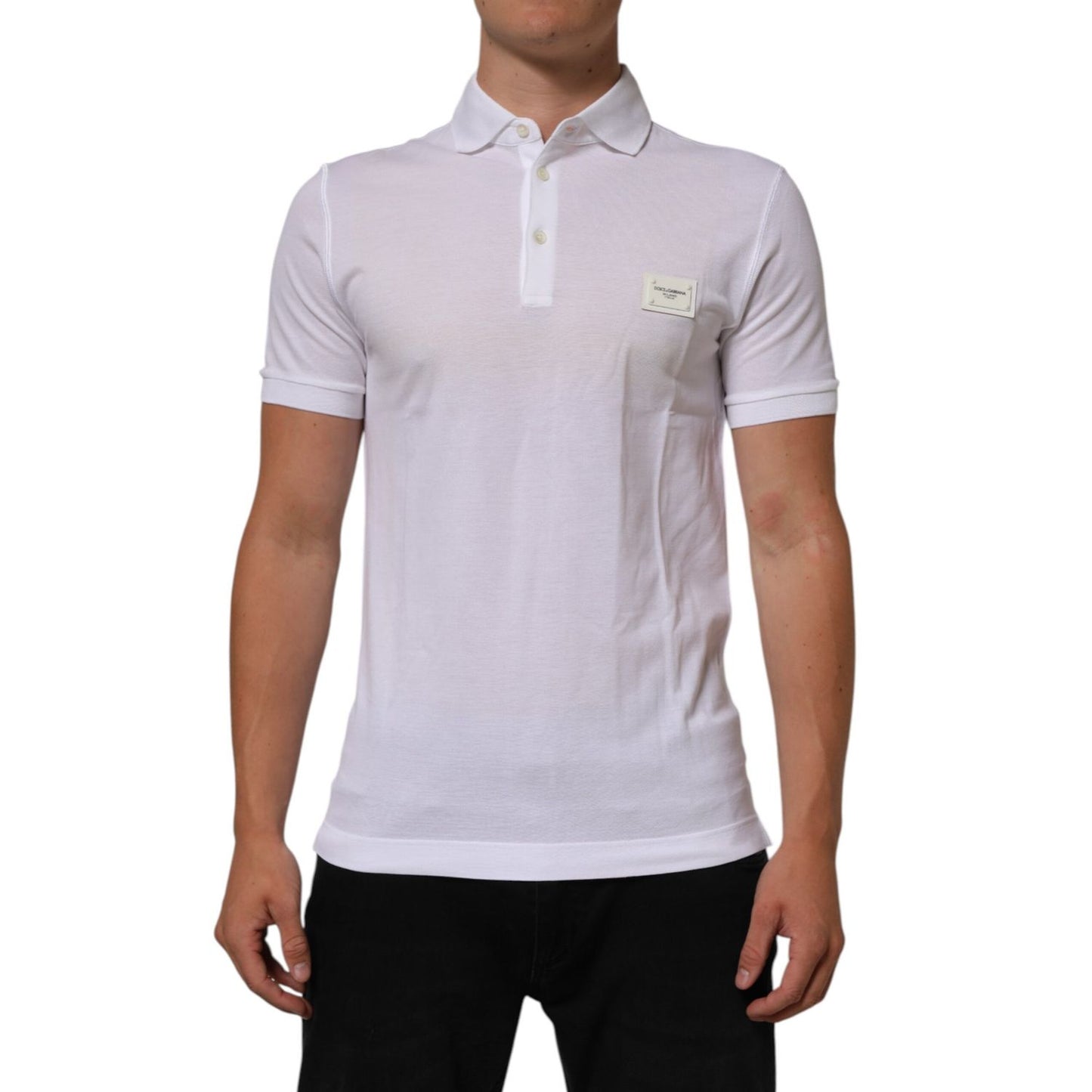 Dolce & Gabbana White Collared Short Sleeves Polo Men T-shirt made from cotton with button closure and logo detail, front view.