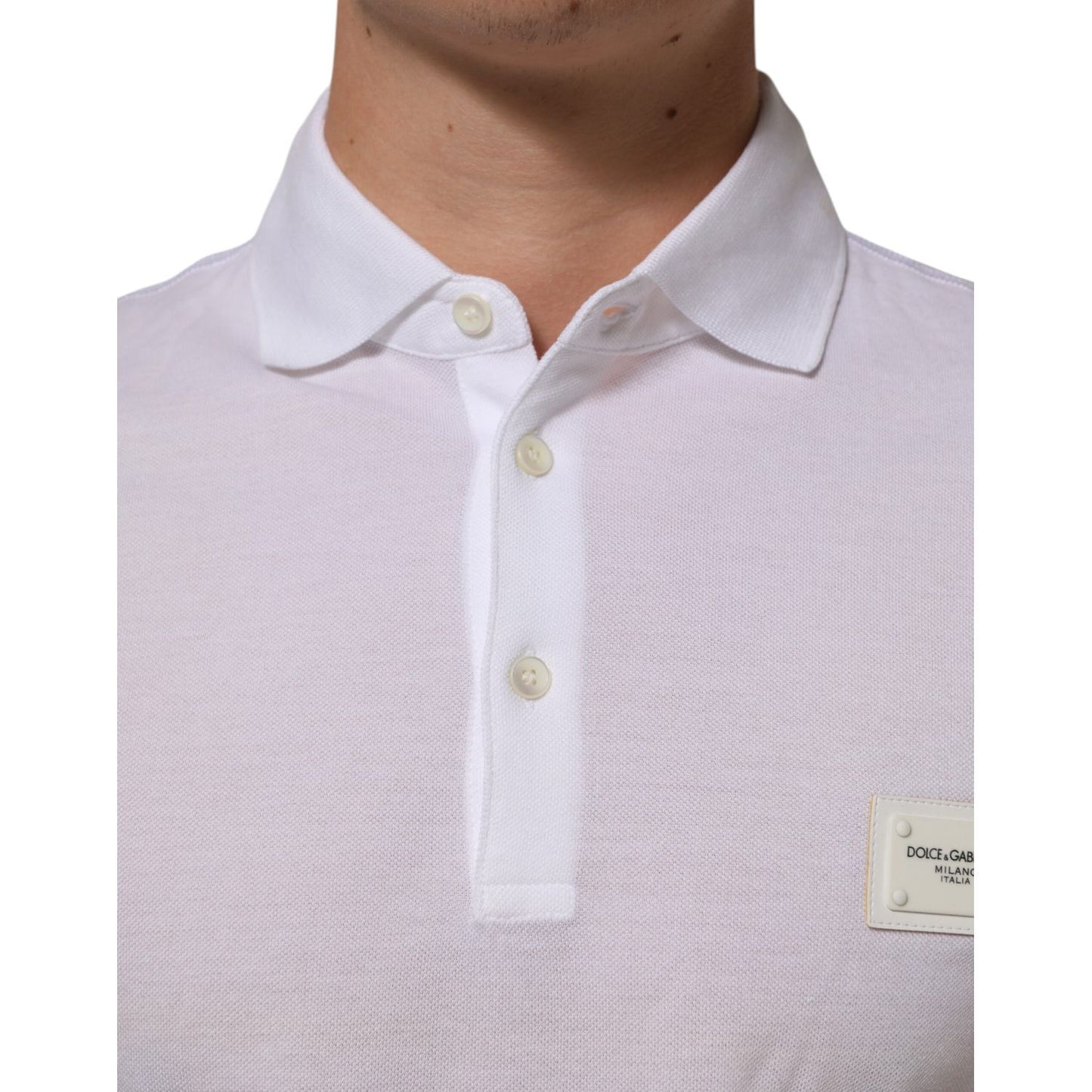 Dolce & Gabbana White Collared Short Sleeves Polo Men T-shirt with button closure, made from 100% cotton, showcasing logo detail.