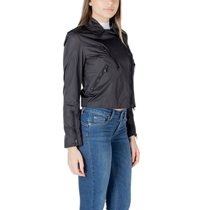 Woman wearing Blauer Black Polyamide Biker Jacket with side pockets and zip closure, paired with jeans.