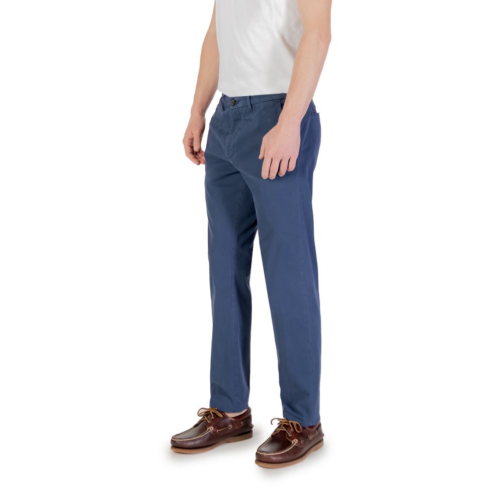 Man wearing Borghese Blue Cotton Skinny Pants with brown shoes and white shirt, showcasing a stylish slim fit for formal or casual look.