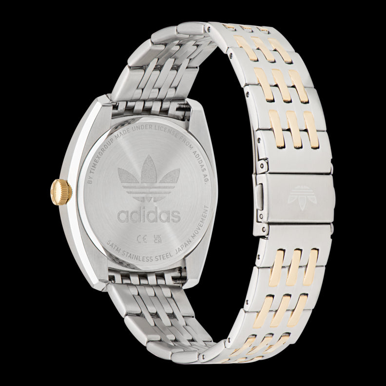 ADIDAS Mod. EDITION ONE wristwatch with stainless steel bracelet and water resistance up to 5 ATM, showing the back of the case.
