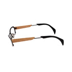 Side view of Alexander McQueen Black Metal Frames with wood temple accents, featuring a sleek unisex design for ultimate style.
