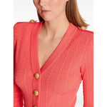 Balmain Long-sleeved twisted knit cardigan Topwear