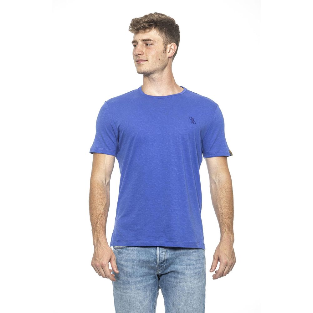 Billionaire Italian Couture Light Blue Cotton T-Shirt with classic round neck and subtle logo embroidery, worn by a model.