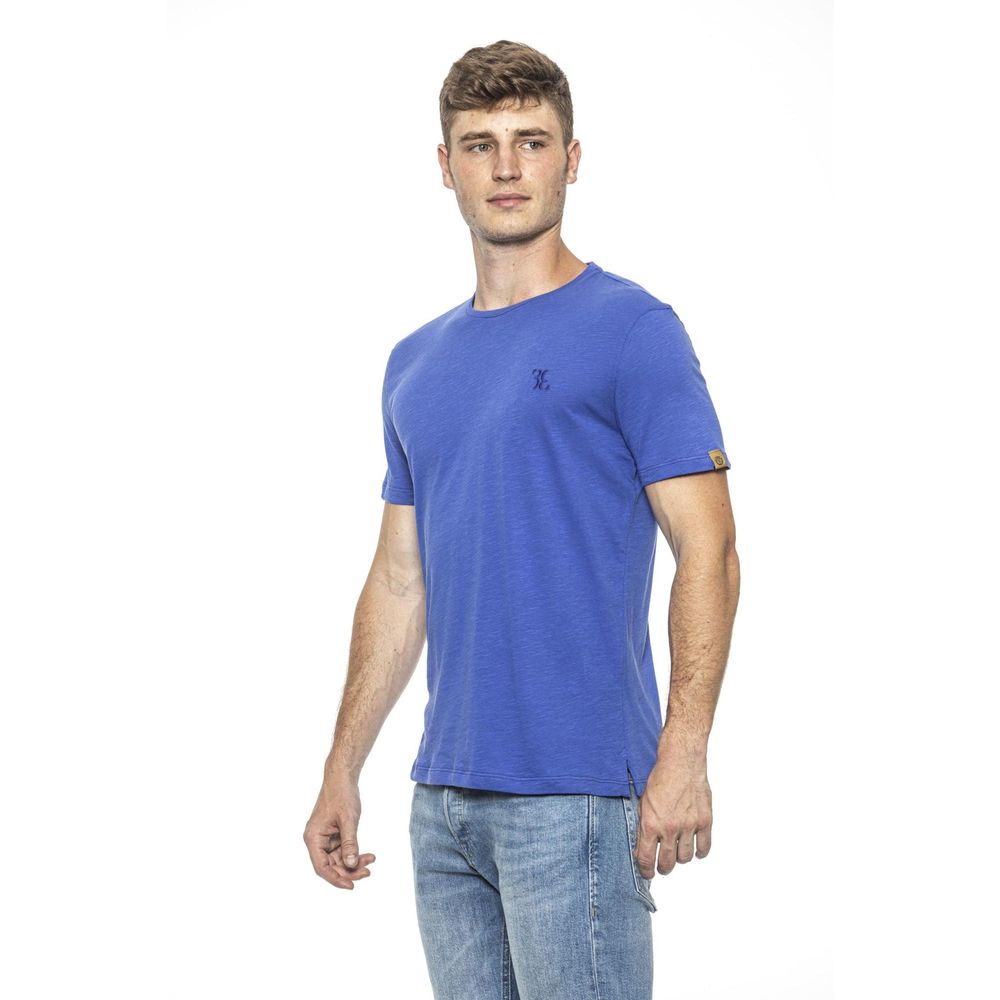 Billionaire Italian Couture Light Blue Cotton T-Shirt with round neck and short sleeves, featuring subtle logo embroidery, worn by a model.