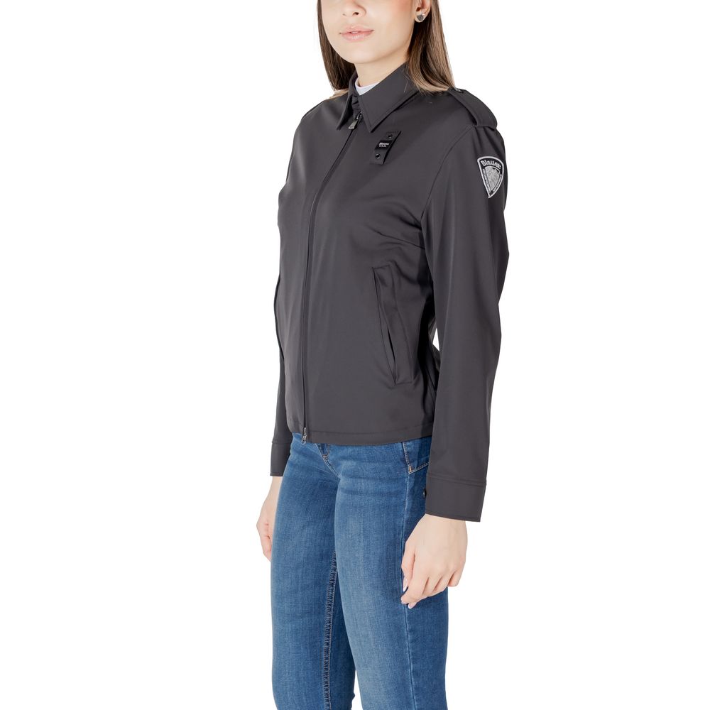 Woman wearing Blauer Black Polyamide Bomber jacket with jeans, showcasing style and refined finishes for cool days.
