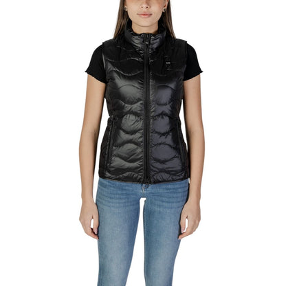 Blauer Black Polyamide Sleveless Jacket with wavy quilting and zip closure, worn by a woman, showing front view.