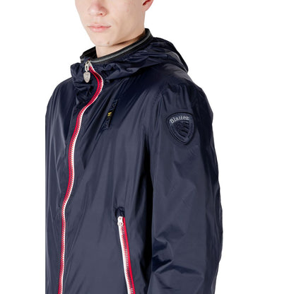 Man wearing Blauer Blue Polyamide Shell Jacket showcasing sporty design and distinctive branding.