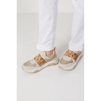 Close-up of Blauer White Cotton Casual Pants paired with stylish sneakers.