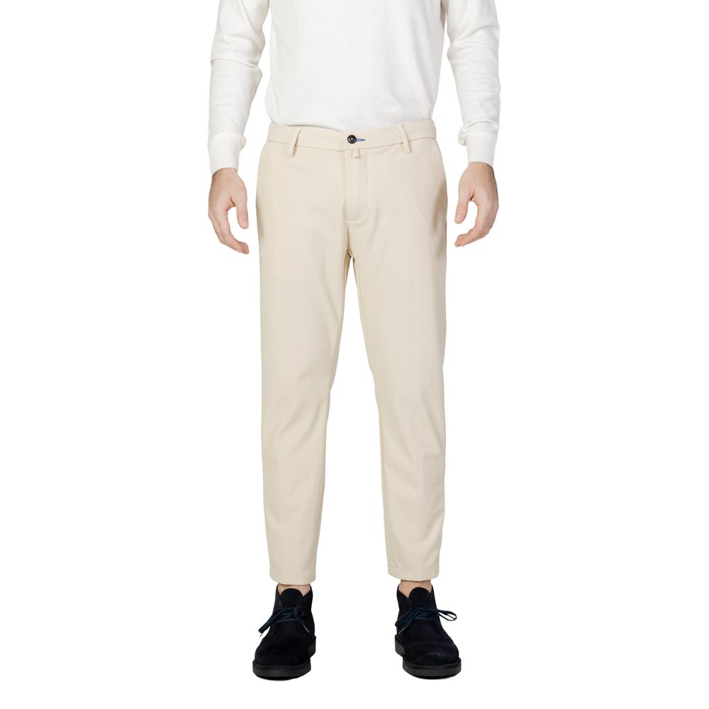 Man wearing Borghese Beige Nylon Casual Pants showcasing elegance and comfort in regular fit, crafted with 80% nylon and 20% spandex.