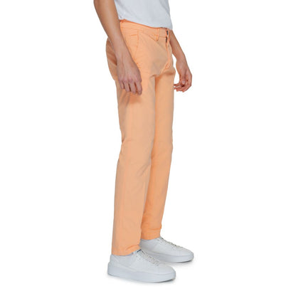 Model wearing Borghese Orange Cotton Chino Pants with side pockets and a modern cut, ideal for spring-summer fashion.