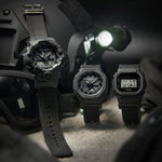 Alt Tag: CASIO G-SHOCK Mod. BOLD - BLACK CORDURA ECO FABRIC STRAP SERIE wristwatch on display with tactical gear, 20 ATM water resistance