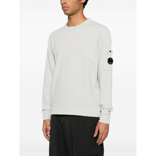 C.P. COMPANY Sweaters Clear Blue - Ice blue crew neck sweatshirt with sleeve patch pocket, ribbed cuffs and hem, true to size fit.