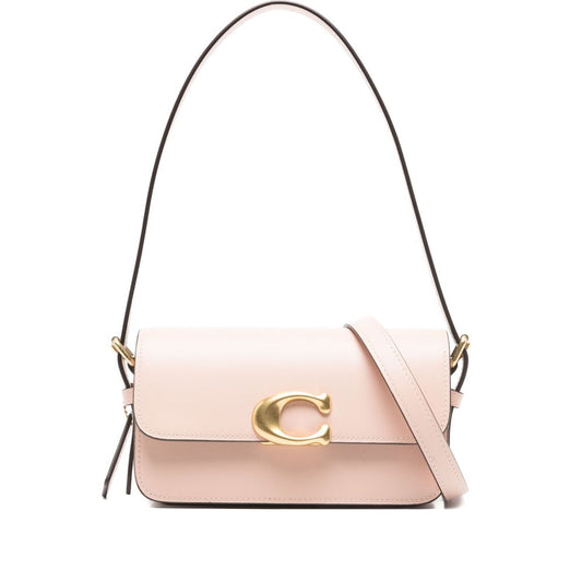 Coach Zoe leather shoulder bag in cream with gold-tone clasp and shoulder strap, rectangular shape, dimensions 7x10x19 cm.