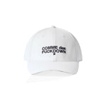 Comme Des Fuckdown White Cotton Hat with logo on front, featuring white colored beak visor, shown in a centered front view.