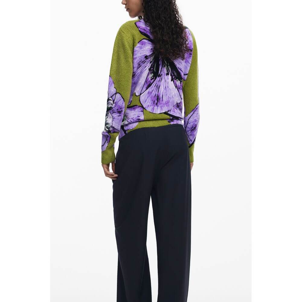 Back view of model wearing Desigual Purple Elastane Women Sweater with bold floral design.