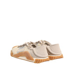Rear view of Dolce & Gabbana Beige Lace Up Low Top NS1 Men Sneakers Shoes featuring beige rubber sole and logo details.