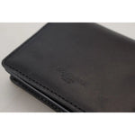 Dolce & Gabbana Black Leather Bifold Shoulder Sling Women Wallet with silver detailing and logo-engraved hardware.