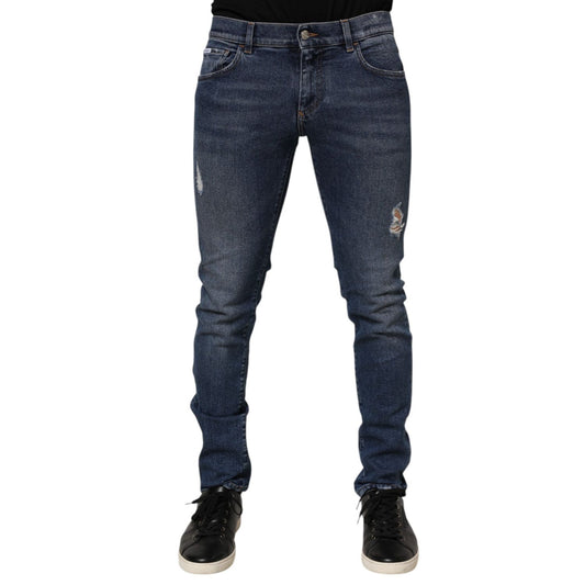 Dolce & Gabbana Blue Cotton Logo Plaque Skinny Men Denim Jeans with distressed details and five-pocket design, front view.