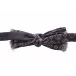 Dolce & Gabbana Blue Silk Baroque Fantasi Tied Bow Tie Papillon with a blue and green patterned design, adjustable neck strap, made in Italy.