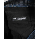 Close-up of label inside Dolce & Gabbana Blue Silver Shiny Silk Skinny Men Trouser Pants, highlighting luxury brand detail.